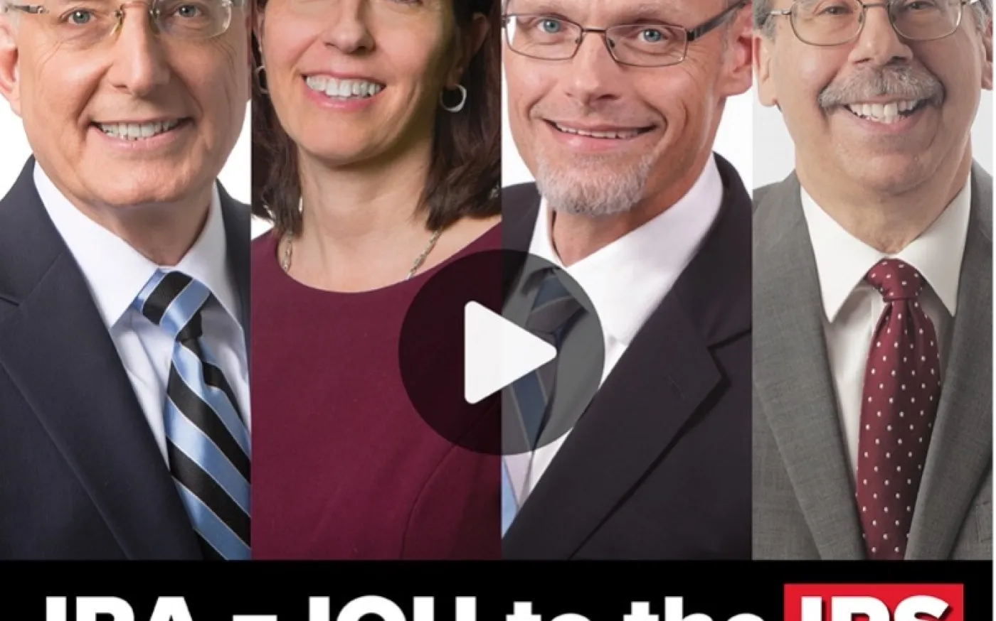 a thumbnail for a video with four people. The text says "IRA = IOU to the IRS: Watch the 2-Minute Trailer from America's IRA Experts"